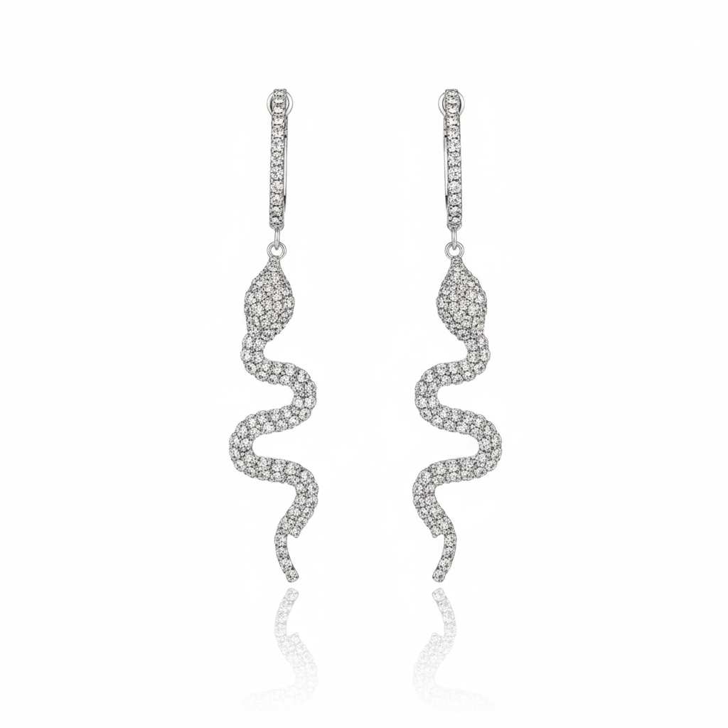  Pair of silver-Serpent Spark Dangle Earrings featuring pavé-set rhinestones. 