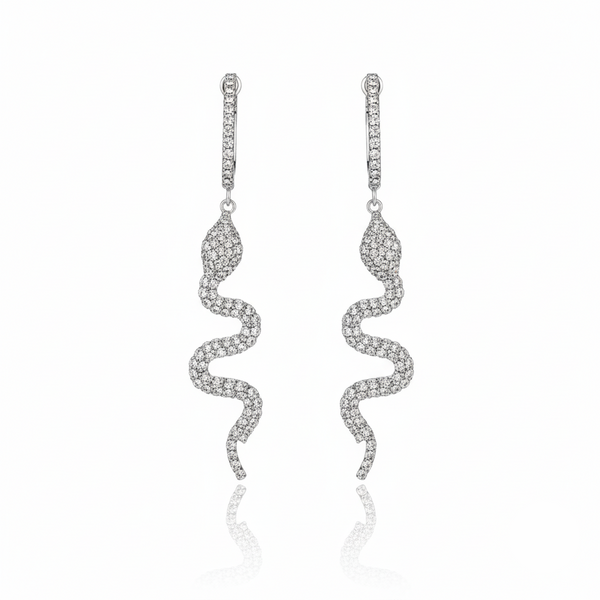  Pair of silver-Serpent Spark Dangle Earrings featuring pavé-set rhinestones. 