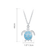 Turtle pendant necklace with blue stone and chain measurements on a white background