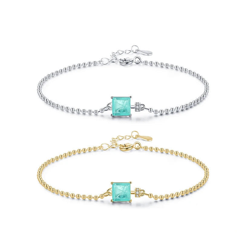 Two bracelets with turquoise stones and gold and silver clasps on a white background, featuring the brand 'MODIAN'.