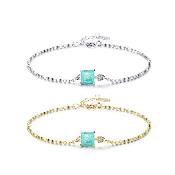 Two bracelets with turquoise stones and gold and silver clasps on a white background, featuring the brand 'MODIAN'.