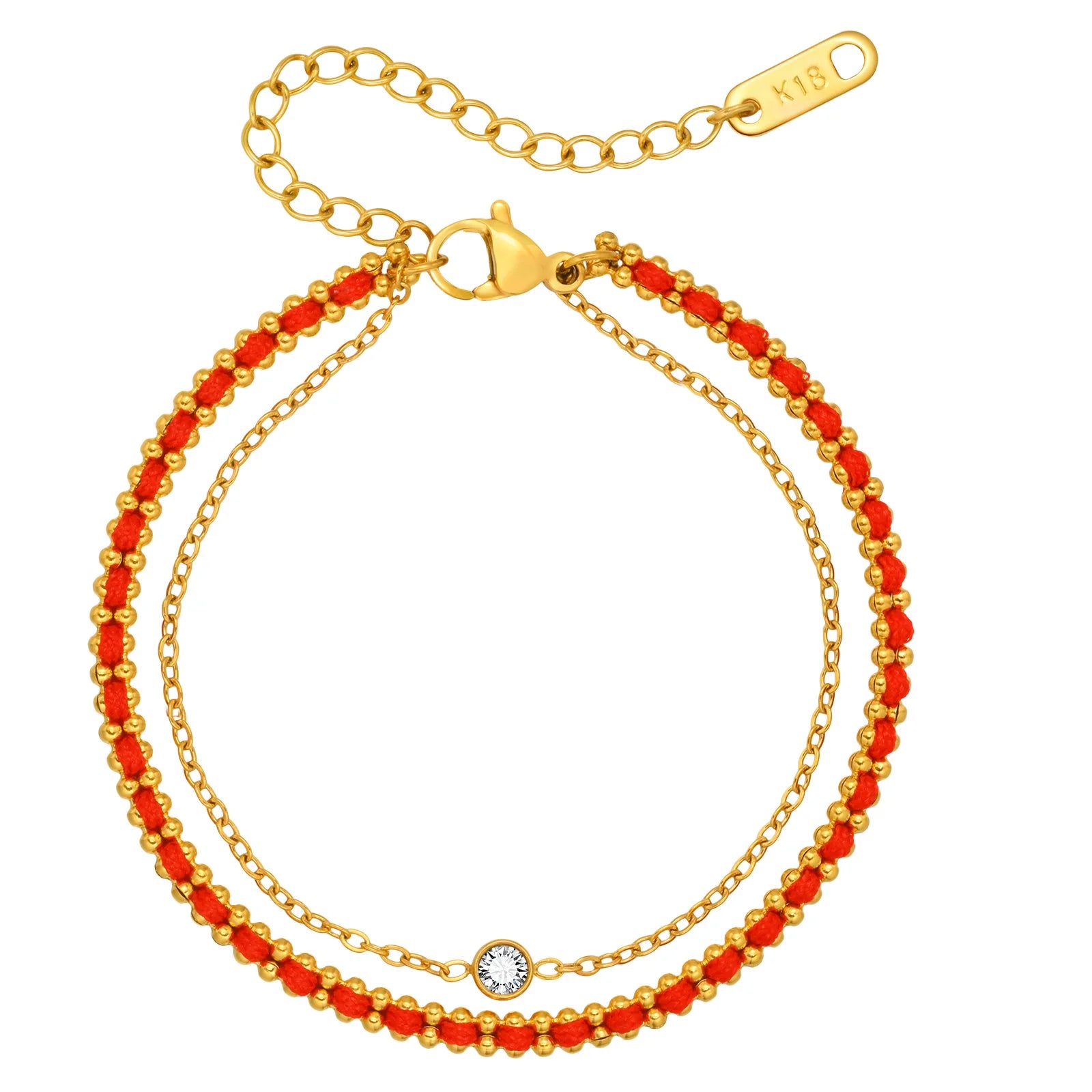 Two gold bracelets with red beads on a white background