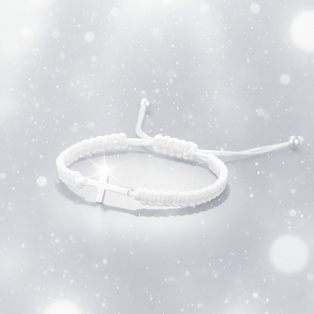 White braided bracelet on a light gray background with snowflake textures