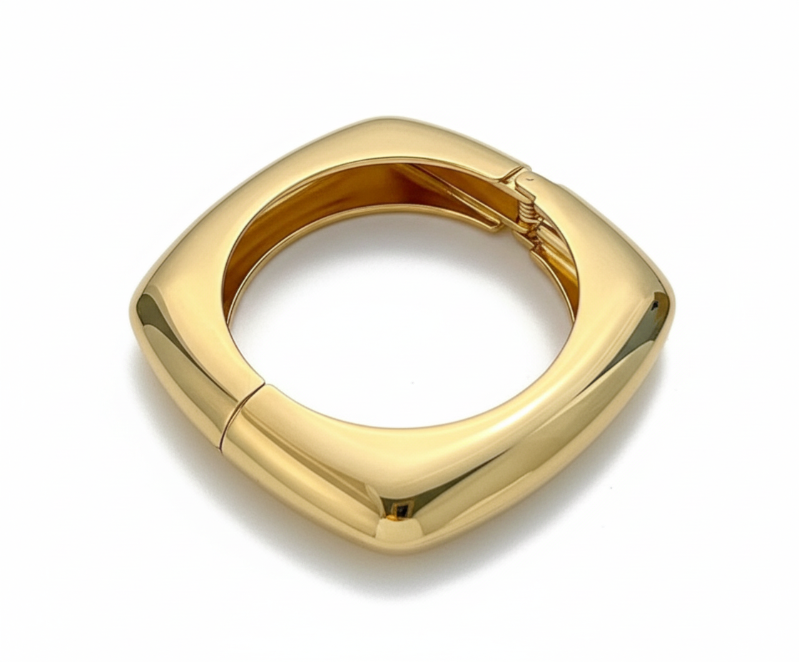 Gold bangel on a white background