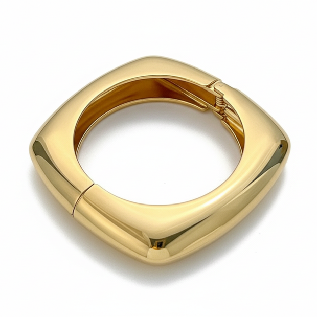 Gold bangel on a white background