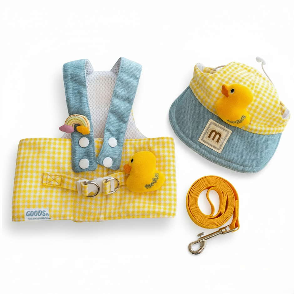 Pet accessory set with yellow rubber duck design on a white background