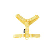 Yellow dog harness on a white background