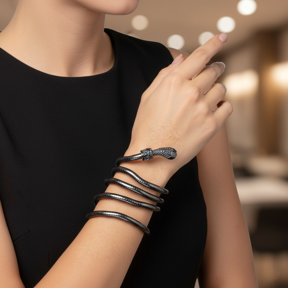 Person wearing a black leather bracelet with a blurred background