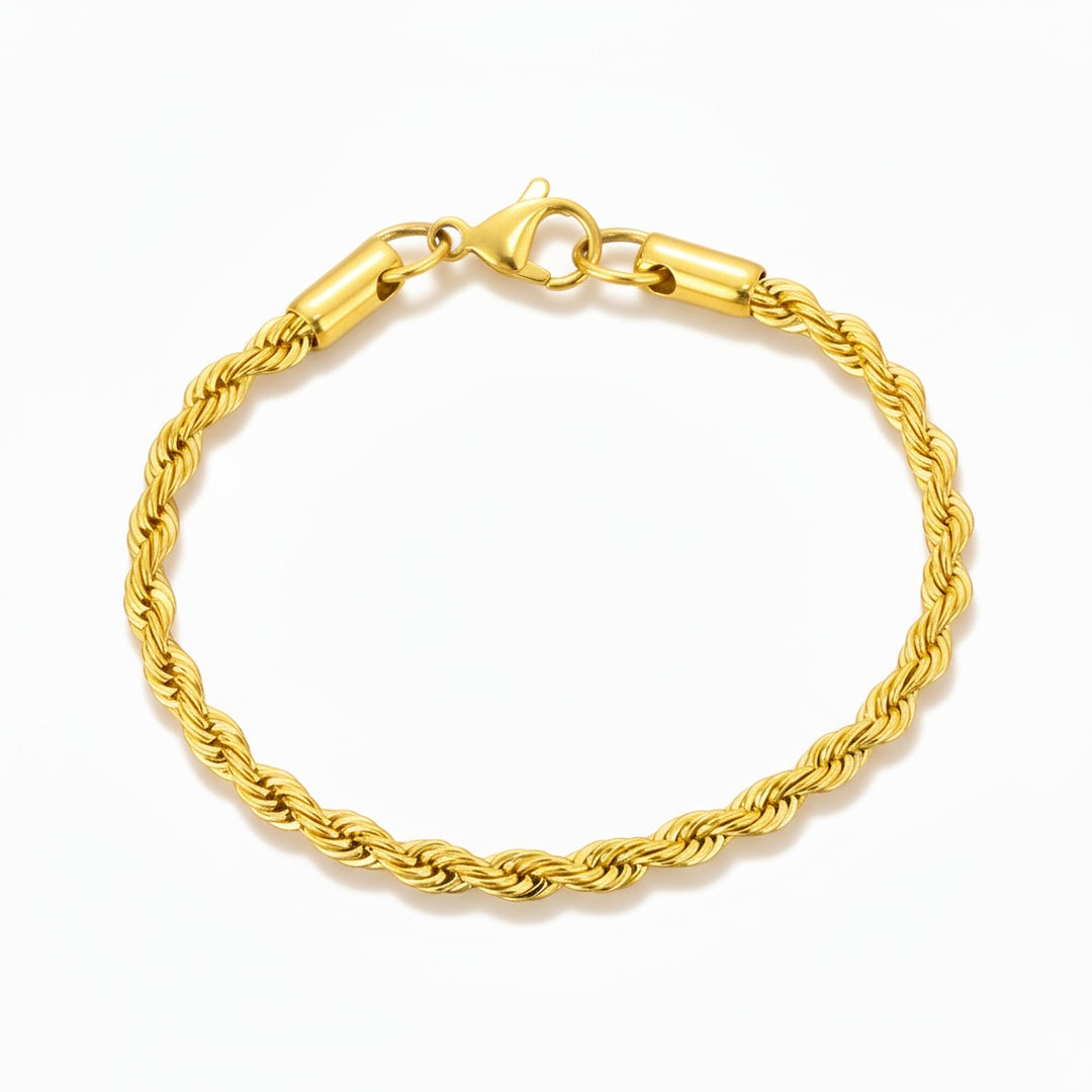 Gold rope chain bracelet on a white background