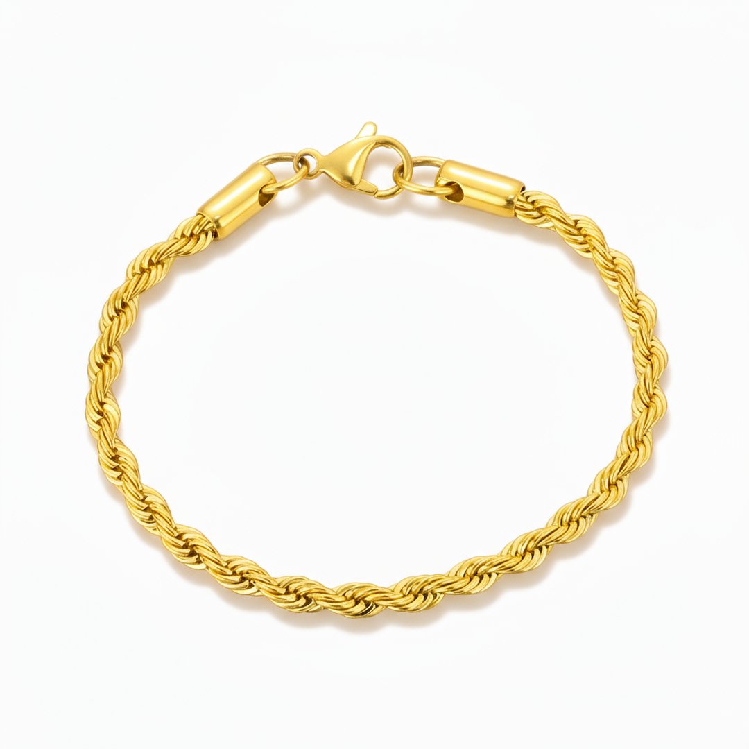 Gold rope chain bracelet on a white background
