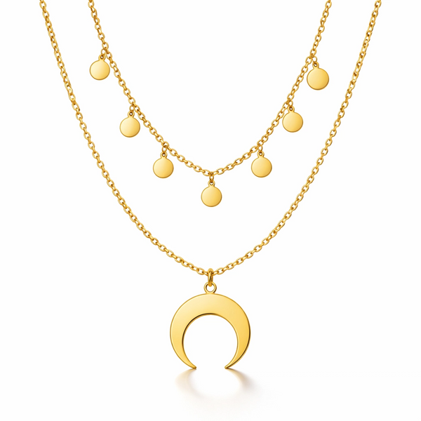 Gold necklace with a crescent moon pendant on a white background