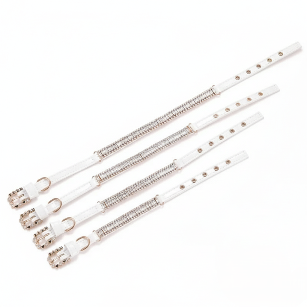 Set of four sizes white straps with gold hardware on a white background