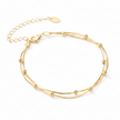 Gold bracelet on a white background