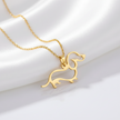 Gold dachshund-shaped pendant on a chain 