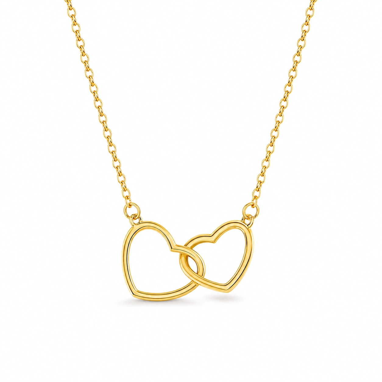 Gold necklace with interlocking heart pendants on a white background