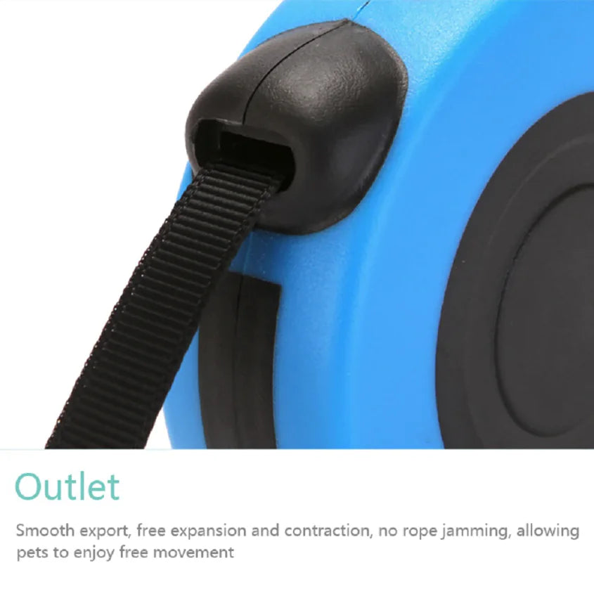Close-up of a blue pet toy with a black outlet and strap on a white background.