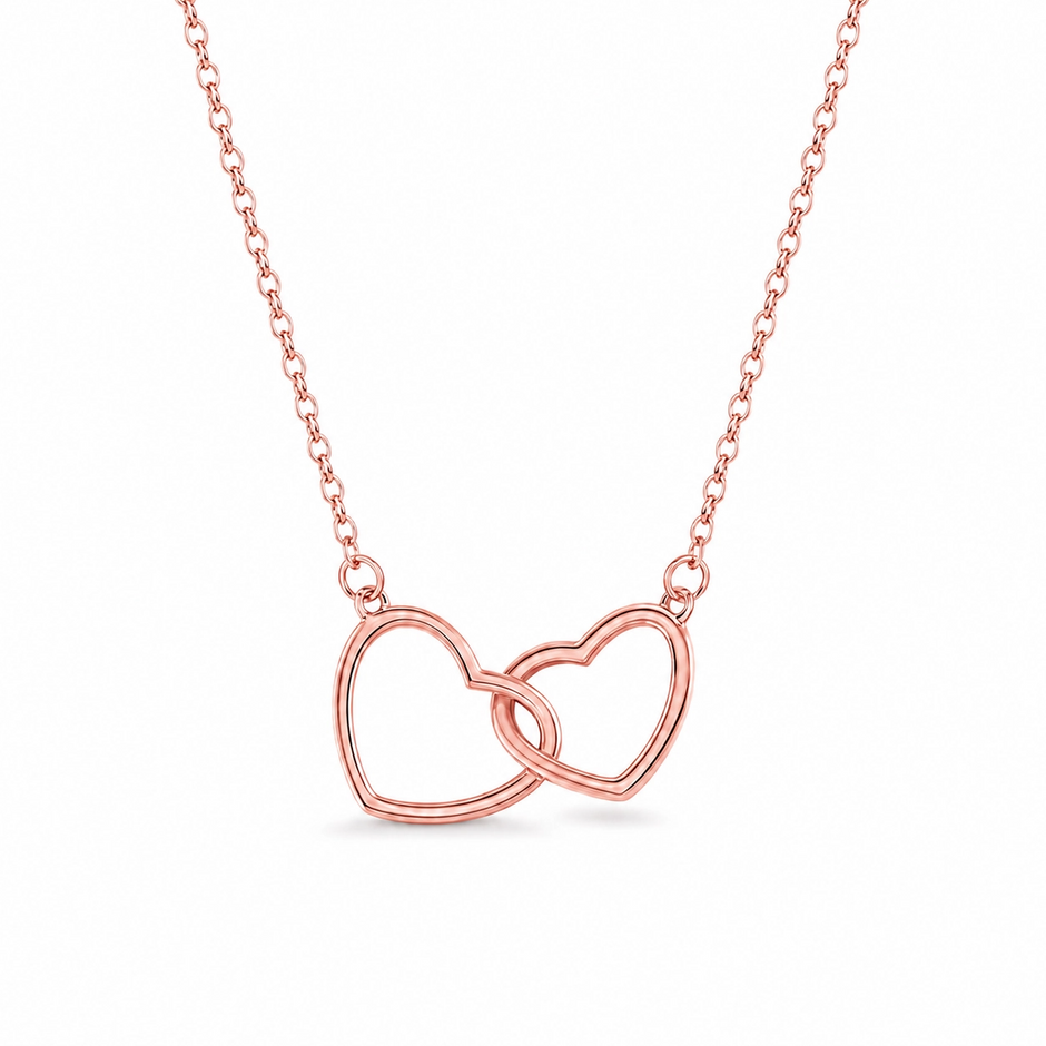 Rose Gold finish interlocking hearts pendant necklace. Romantic titanium steel jewelry with two intertwined hearts. Perfect gift for her.