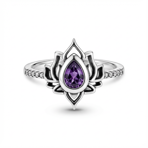 Silver lotus ring for recovery
with a purple gemstone on a white background