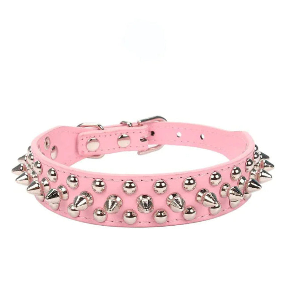 Pink dog collar with silver spikes on a white background