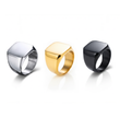 Three SteelForce rings for men - 316L stainless steel band in silver, gold, and black on a white background