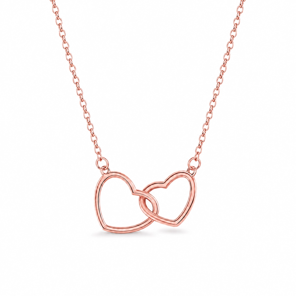 Rose gold necklace with interlocking heart pendants on a white background
