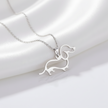 Silver dachshund-shaped pendant on a chain 