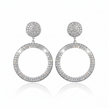 Pair of silver hoop earrings with circular designs on a white background