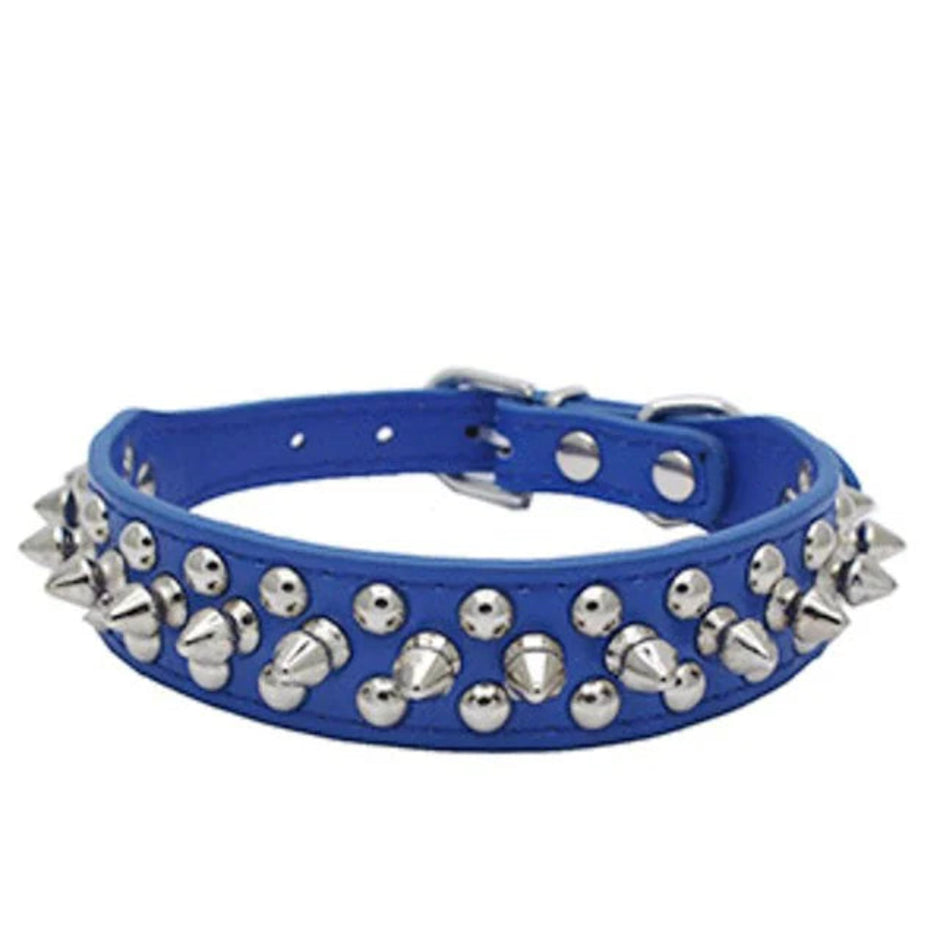 Blue dog collar with silver spikes on a white background
